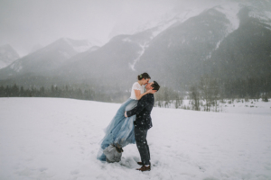 A coule eloping in an Alberta winter storm.